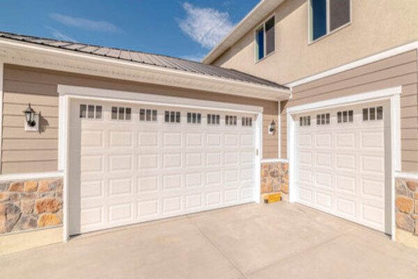 horizontal wood accent over the garage door